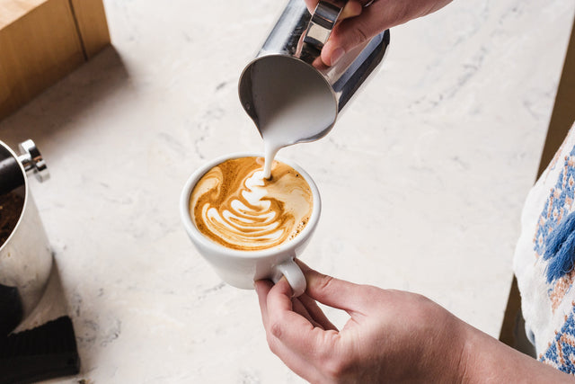 pouring latte art clive coffee