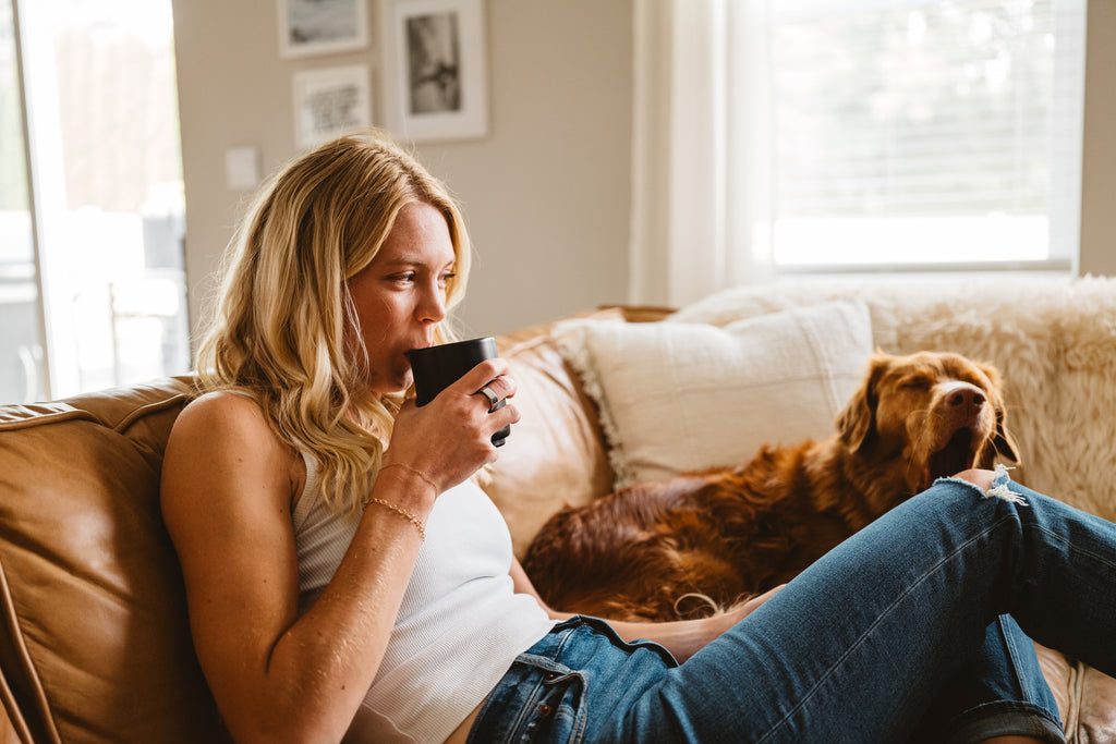 Woman sipping a coffee lifestyle photo by ben matthews