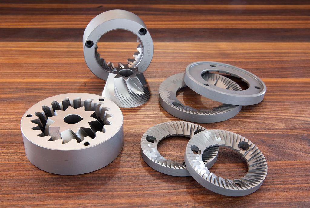 A variety of conical and flat grinder burrs knockout by clive coffee