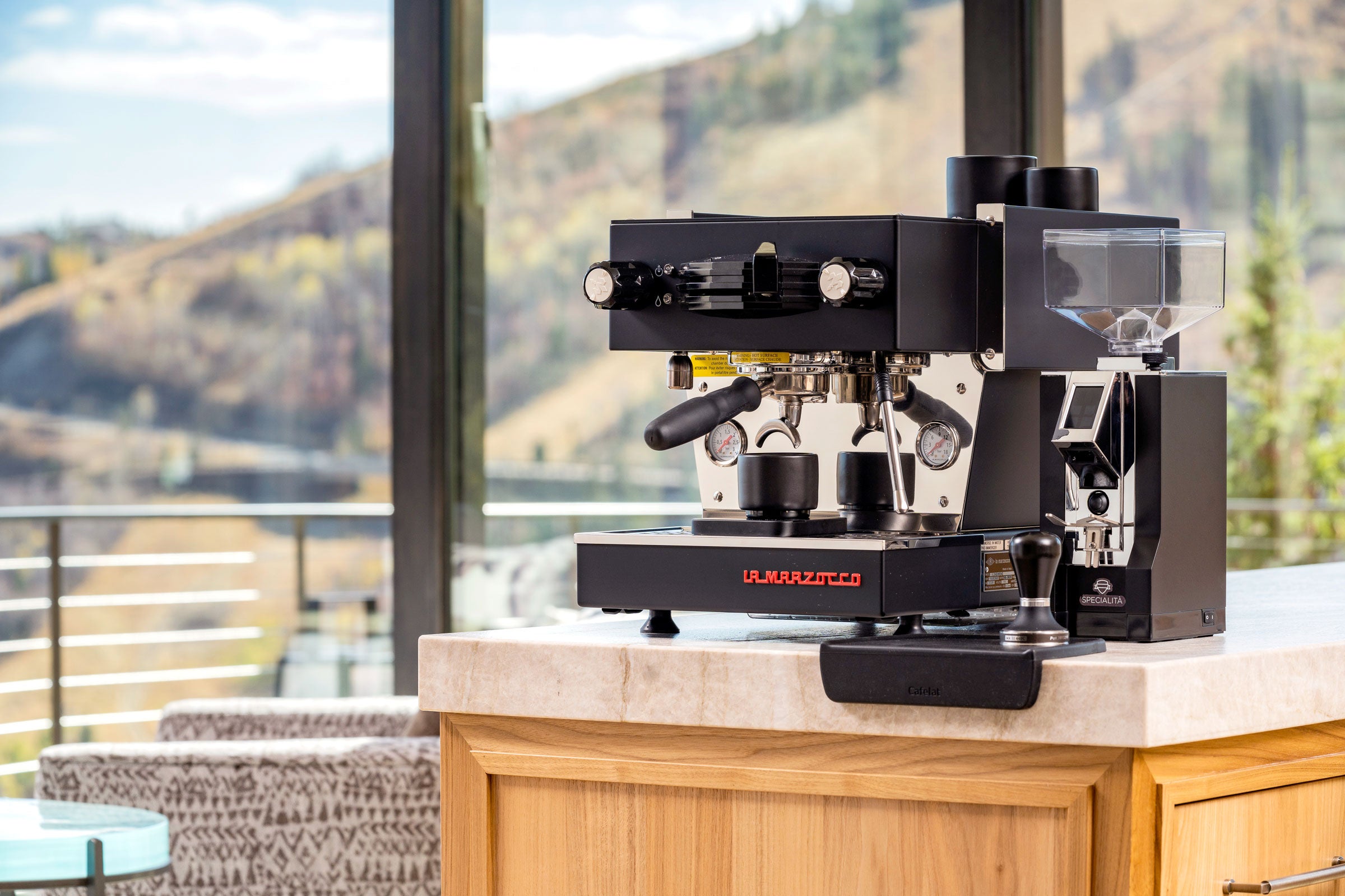 La Marzocco Linea Mini espresso machine in black with the Eureka Mignon specialita espresso grinder in black