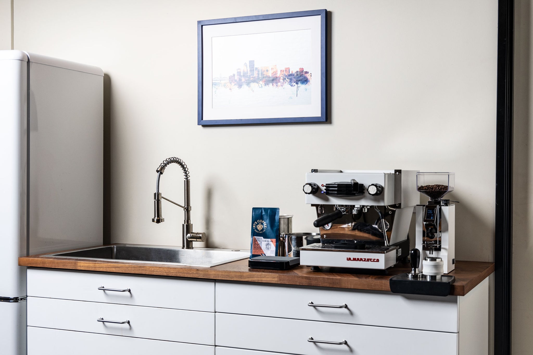 La Marzocco Linea Mini espresso machine in white with the Oro XL espresso grinder